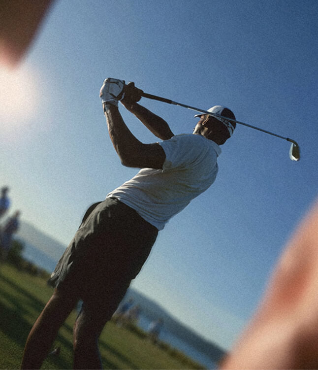 Golfer mid-swing